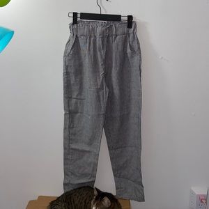 Black and white striped trousers